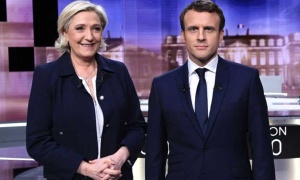 Macron sale reforzado tras el duro debate con Le Pen